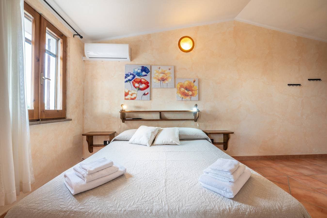 Foto 3 von 25: Ferienhaus 'Brezza Di Mare' mit Meerblick, privater Terrasse und Klimaanlage