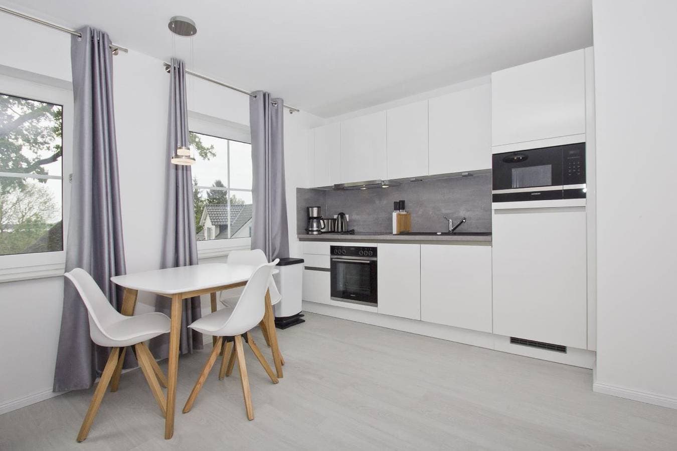 Foto 6 von 21: Moderne Ferienwohnung mit Gartennutzung - Haus Inselwind FeWo MEERbucht