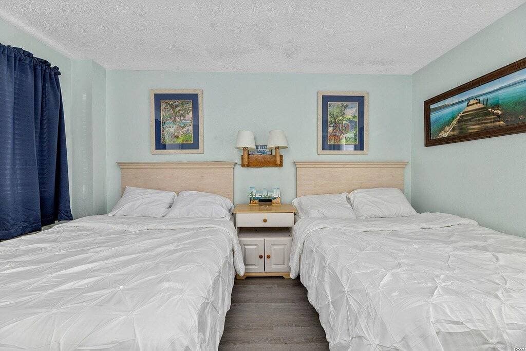 Foto 4 von 18: Beachfront Condo, sleeps 6, pools, hot tub, tiki bar, golf carts allowed