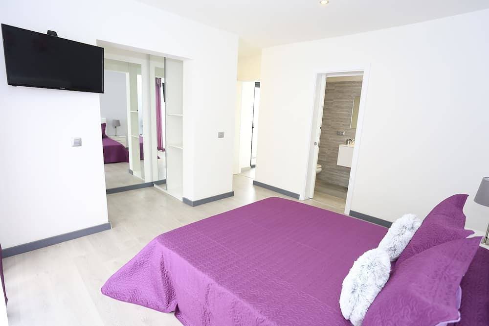 Foto 7 von 30: Einzelhaus mit 3 Schlafzimmern, 3 Bädern, Wohnzimmer, Küche, Garten