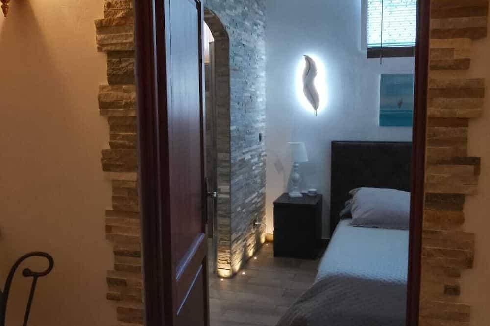 Foto 3 von 29: Suite-style room with a pool