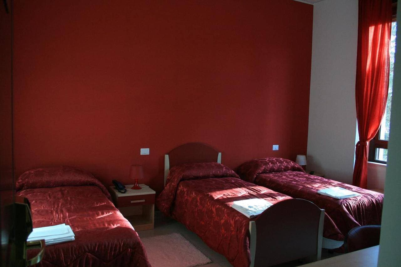 Foto 6 von 14: Triple Room