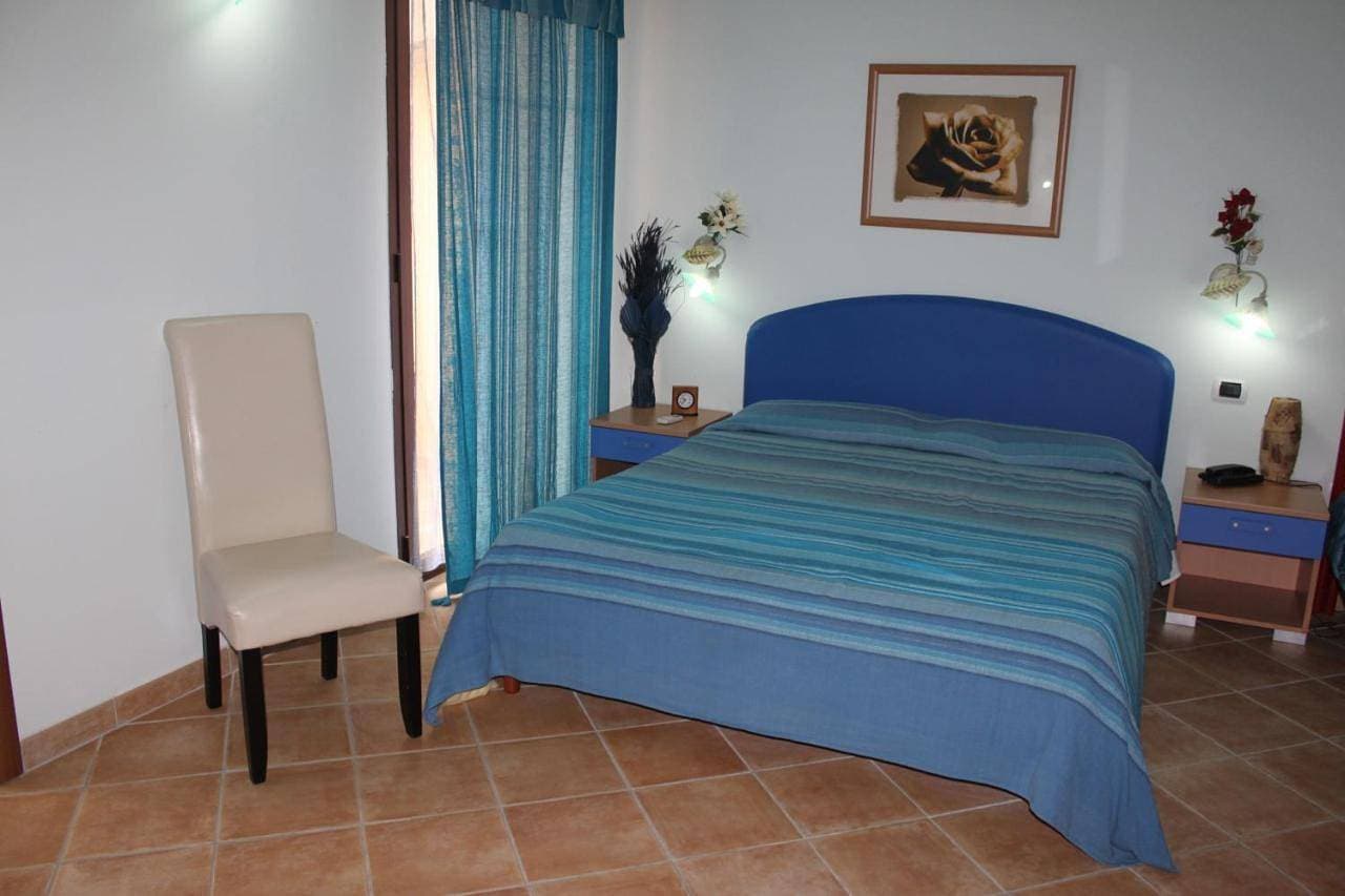 Foto 10 von 18: Quadruple Room