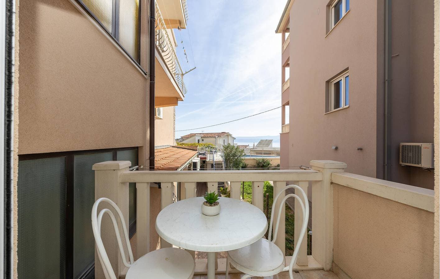 Foto 6 von 23: Apartment mit Meerblick, Wifi, AC, Pool und Terrasse