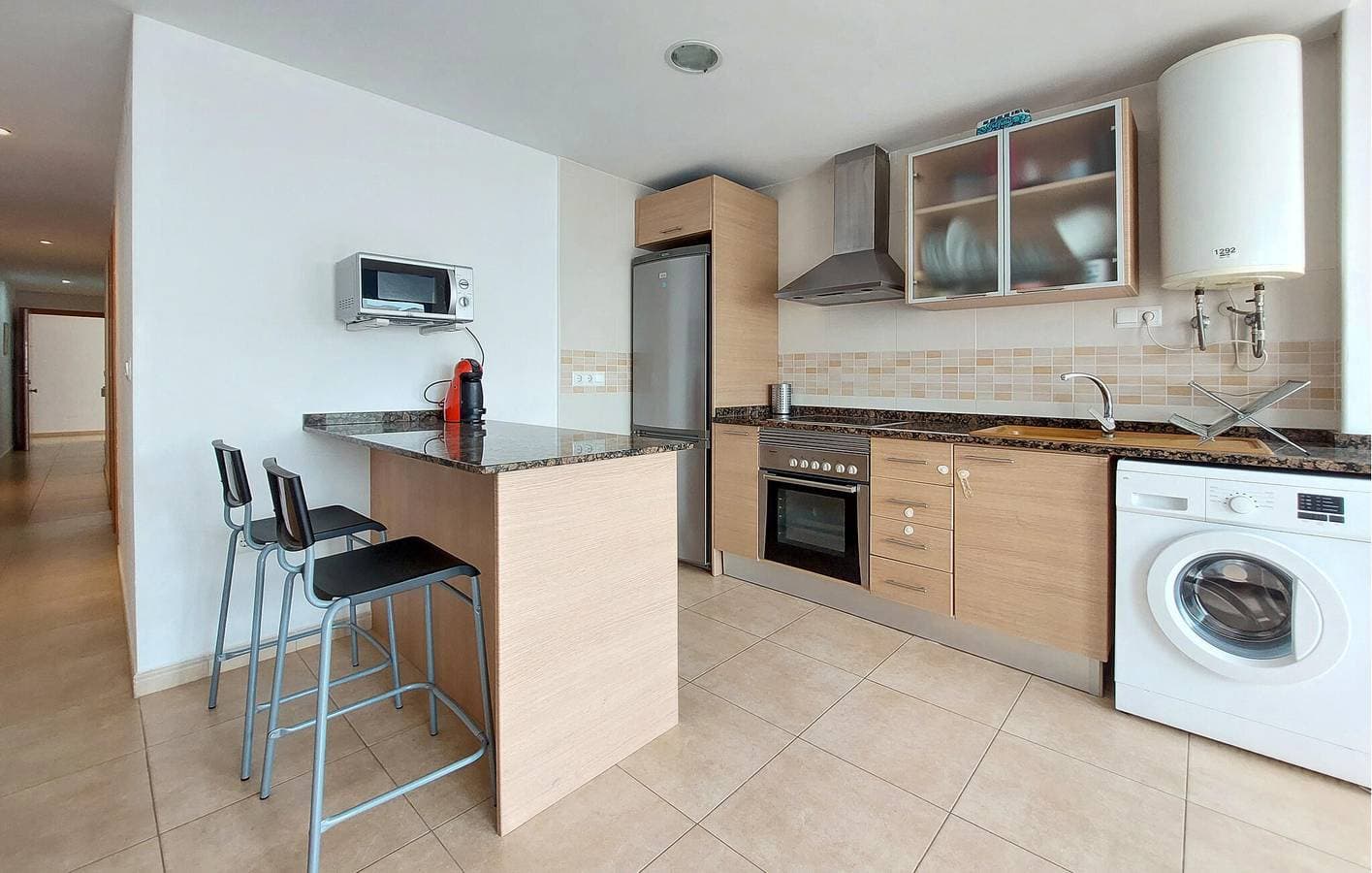 Foto 9 von 15: Strandblick Apartment mit AC, Waschmaschine, Parkplatz - Playa Masbó 900m