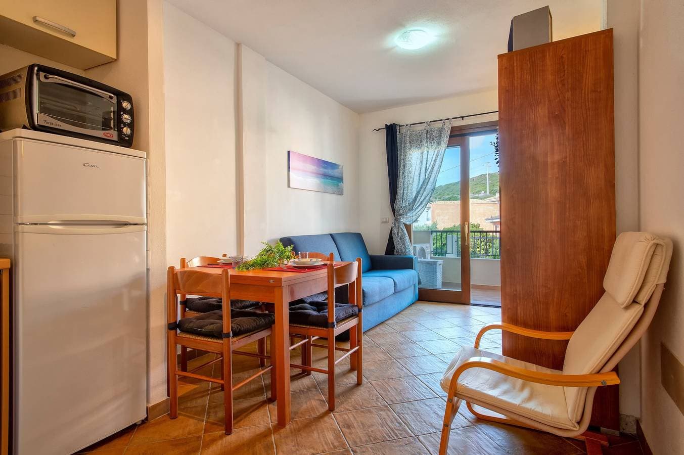 Foto 6 von 26: Ferienwohnung 'Gio's' mit Gemeinschaftspool, privatem Garten und Klimaanlage