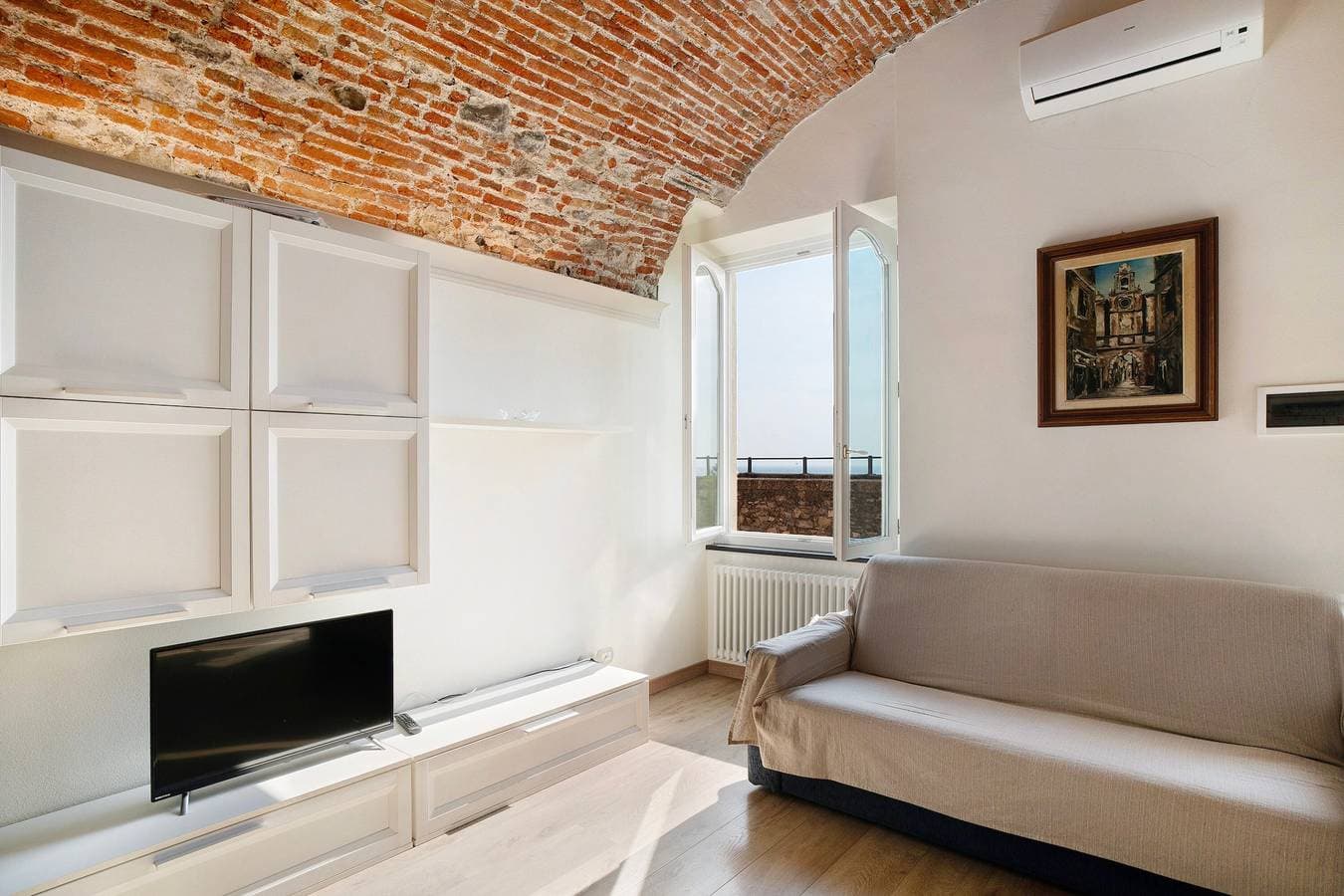 Foto 6 von 20: Apartment 'Actis2, Borgo Dei Pescatori' mit Balkon, WLAN und Klimaanlage