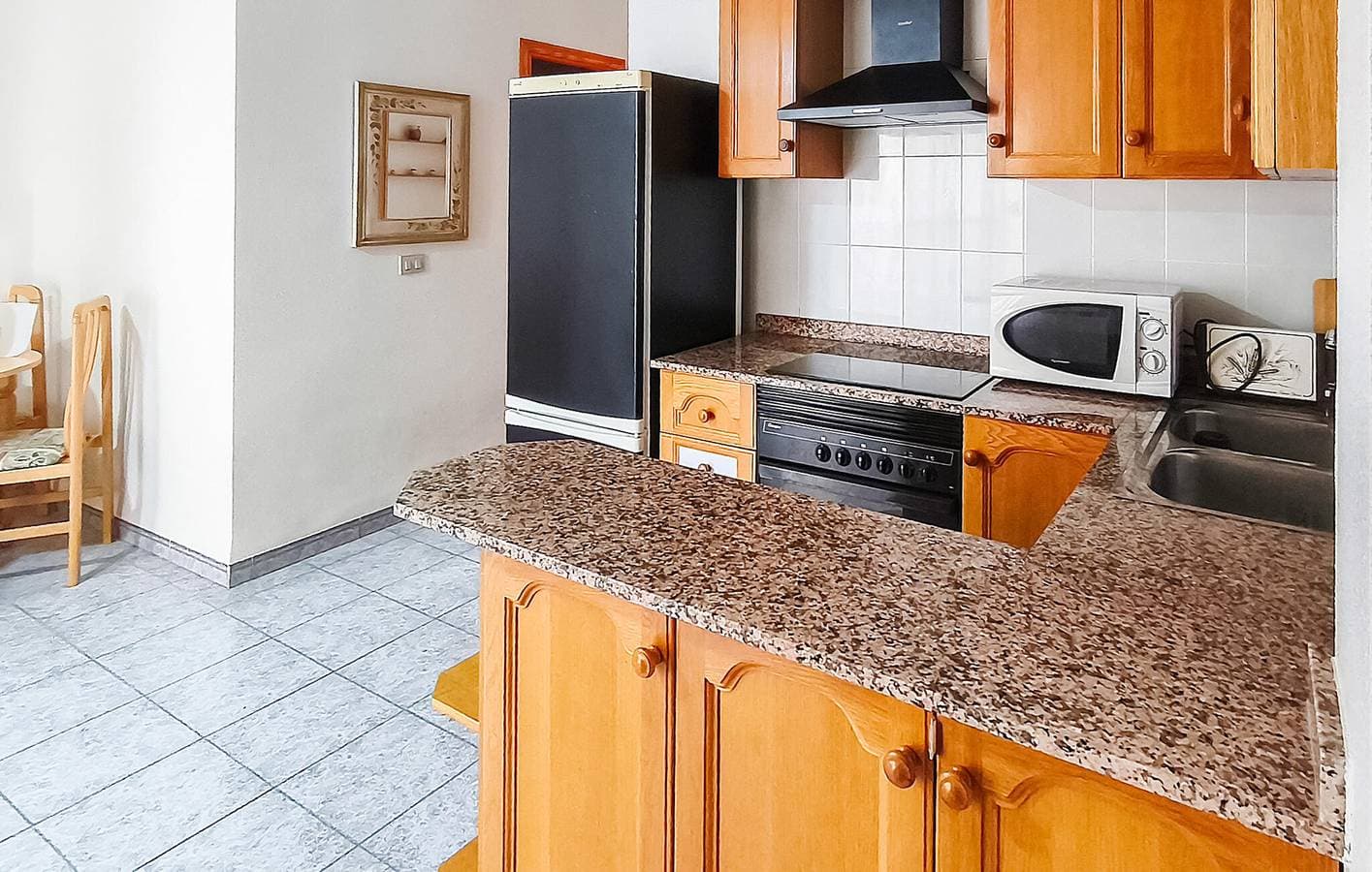 Foto 4 von 16: Moderne 70qm Wohnung: AC, Parkplatz, Terrasse, 100m zur Playa Masbó