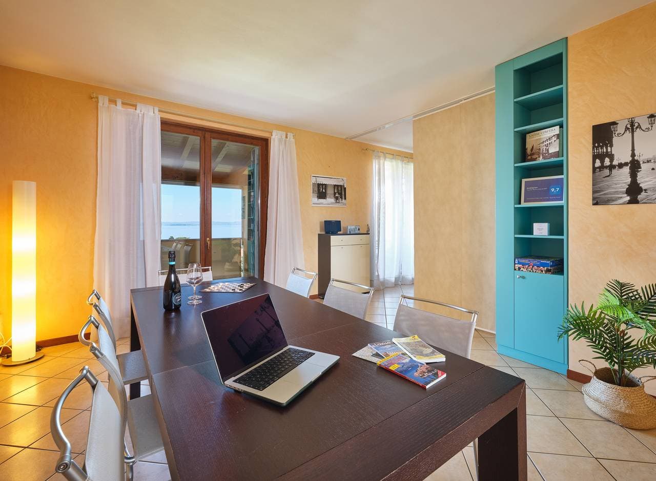Foto 11 von 44: Regarda - "Perla Del Garda" Wohnung in Lazise mit Terrasse mit Seeblick und Pool