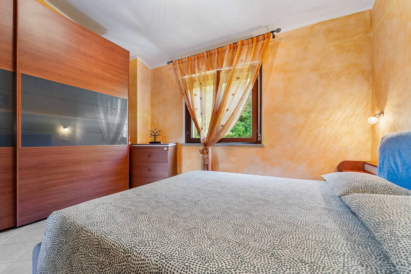 Foto 10 von 26: Ferienhaus „Patty“ mit privatem Garten, Balkon und Klimaanlage