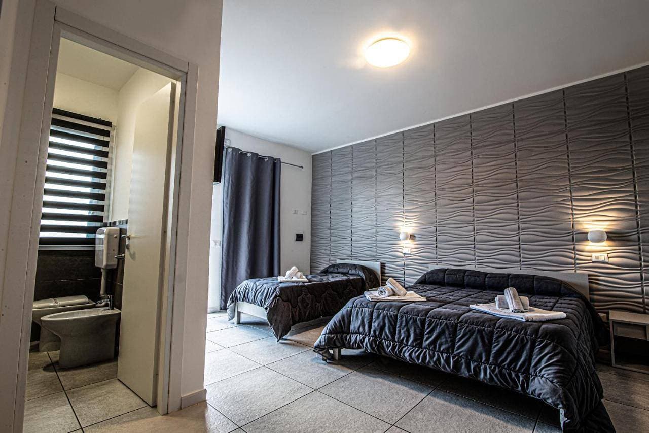 Foto 7 von 17: Triple Room with Garden View