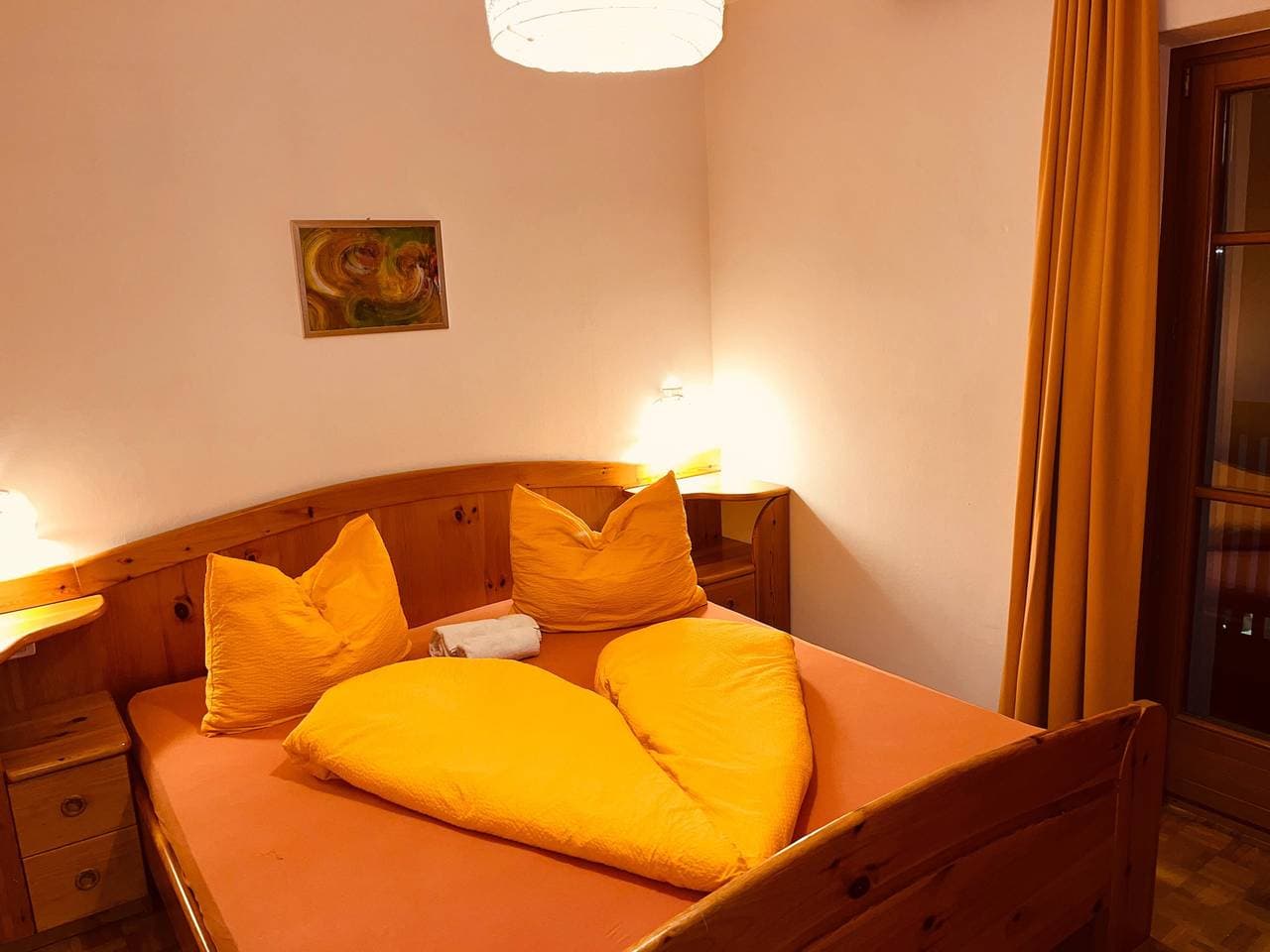 Foto 10 von 34: Ferienwohnung 'Residenz Zirmer Wohnung Feuer' mit Bergblick, Gemeinschaftsgarten und WLAN