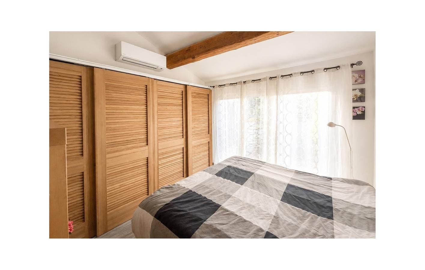 Foto 10 von 12: Moderne Wohnung mit Pool, WLAN, Klimaanlage und Terrasse in der Nähe von Titi Pizza