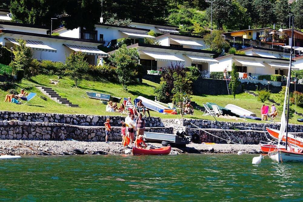 Direkt am See mit eingezäunt Garten 1