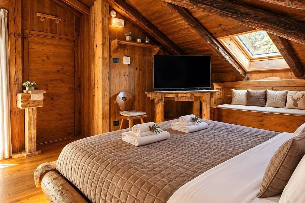 Foto 9 von 20: Zimmer 'Camera Negritella' mit Bergblick, WLAN und Klimaanlage