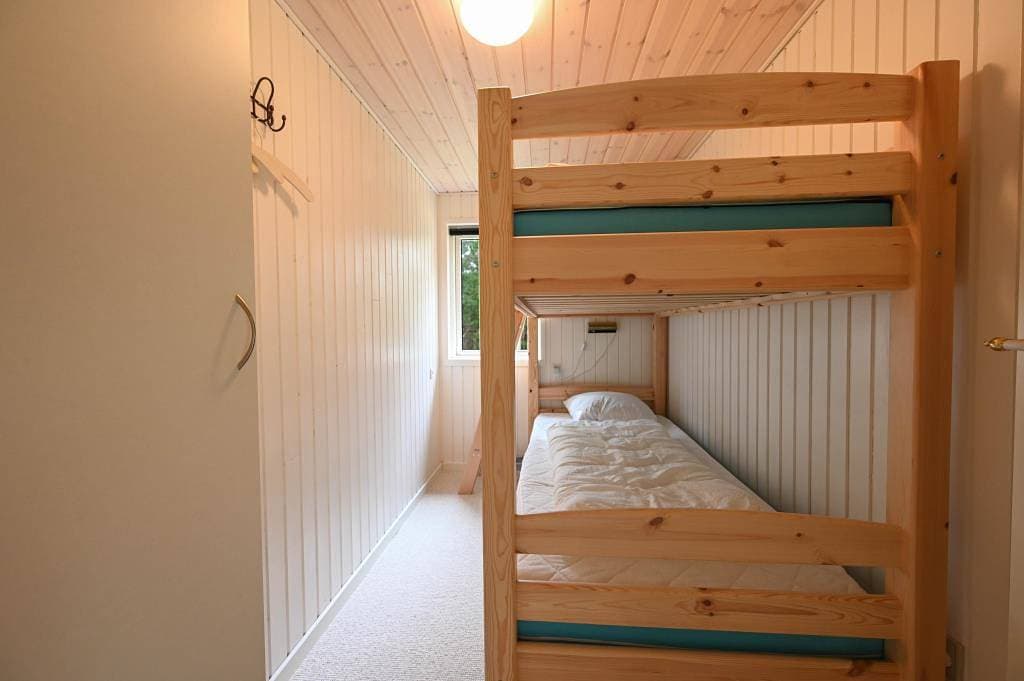 Foto 13 von 15: Gut geschützt liegendes Ferienhaus mit Reetdach und Sauna