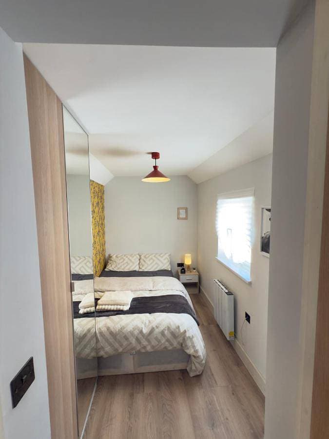 Foto 2 von 9: Double Room with Shared Bathroom