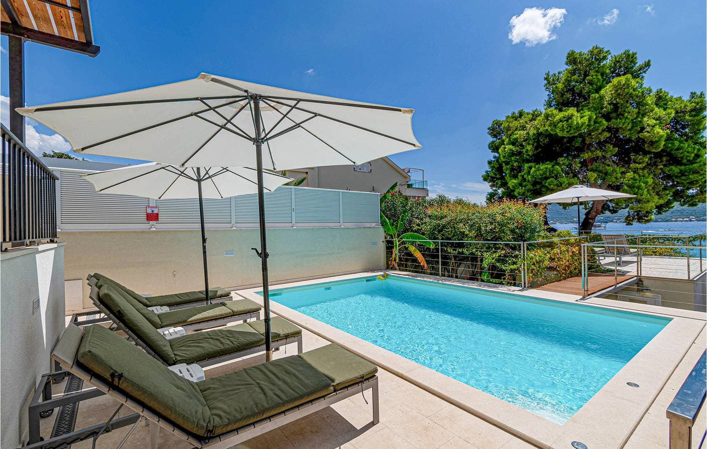 Foto 6 von 50: Reizende 2-Zimmer-Wohnung mit Pool in Strandnähe – WLAN & Terrasse