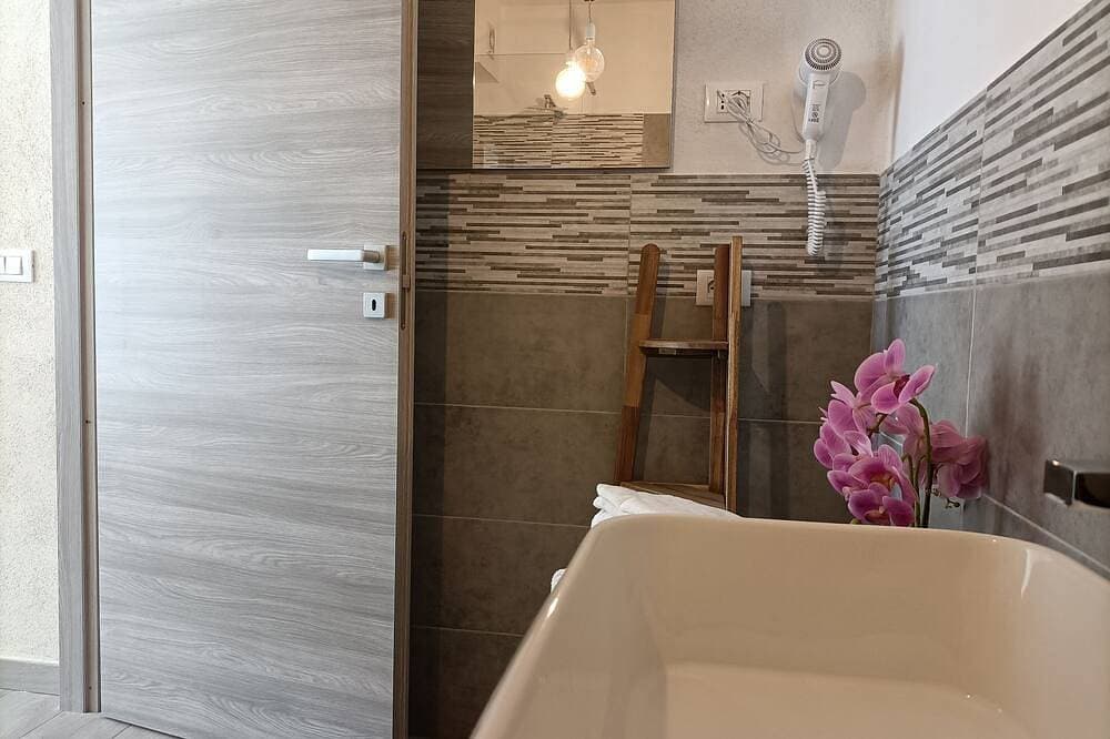 Foto 9 von 12: Il Cedro - double room with garden (no apartment)