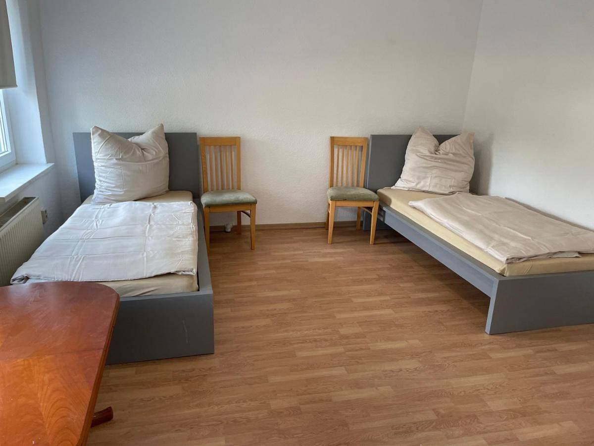 Foto 7 von 25: Triple Room with Private Bathroom