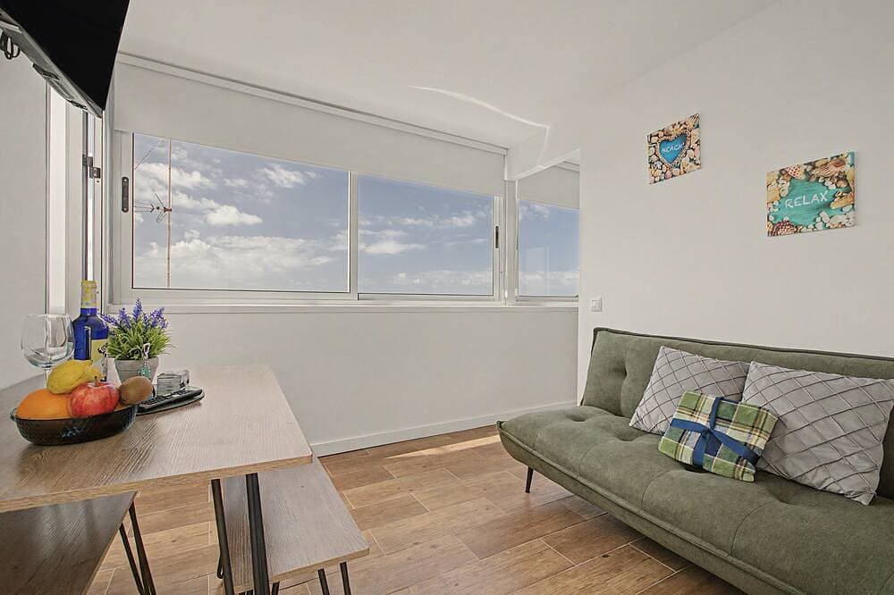 Foto 12 von 27: Ferienwohnung 'Ático La Morena' mit Meerblick, privater Terrasse und WLAN
