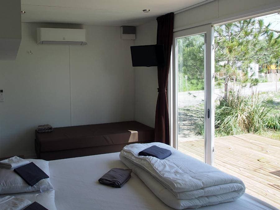 Foto 7 von 26: Camping Les Bois Flottés - Mobilheim 2 personen - Mini Suite 2Pers.
