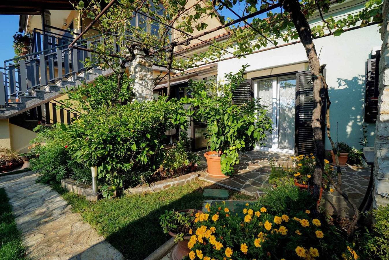 Foto 2 von 23: Ferienwohnung mit Garten zur gemeinsamen Nutzung