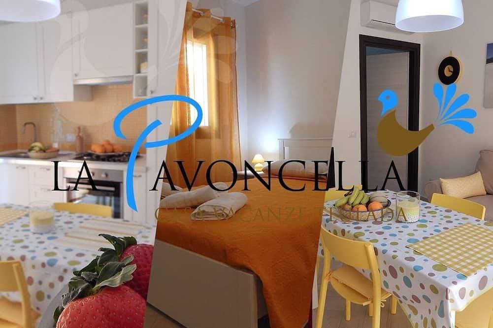 Foto 4 von 6: Ferienwohnung La Pavoncella App 1