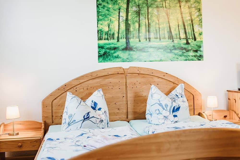 Foto 7 von 17: Zimmer 12 - Rebentisch - Hotel * Ferienwohnungen * Restaurant