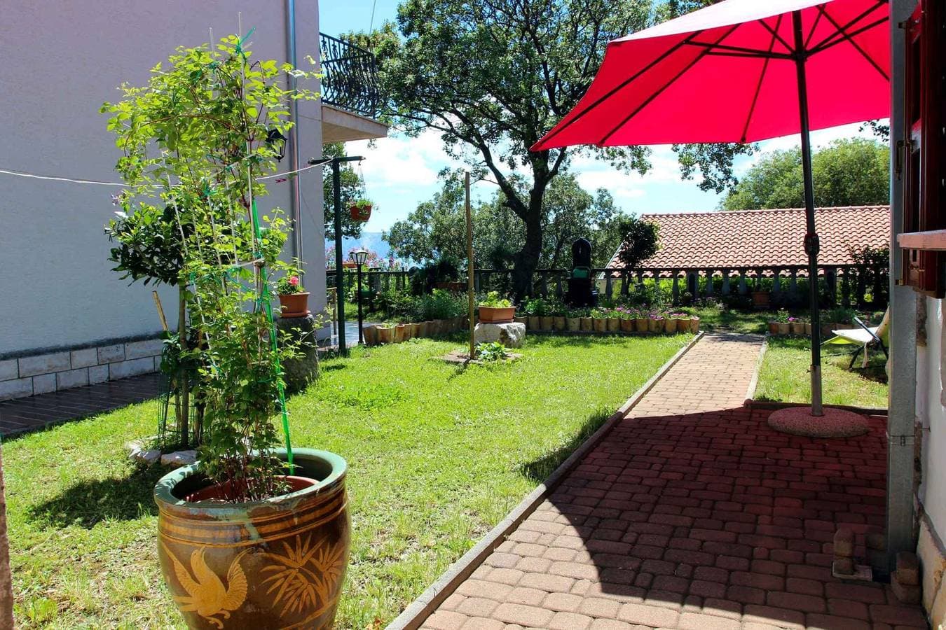 Foto 4 von 25: Ferienhaus mit Garten