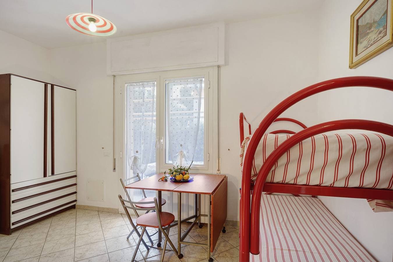 Foto 8 von 22: Apartment 'Casa Dei Garofani – Kostenfreier Parkplatz' mit privatem Garten