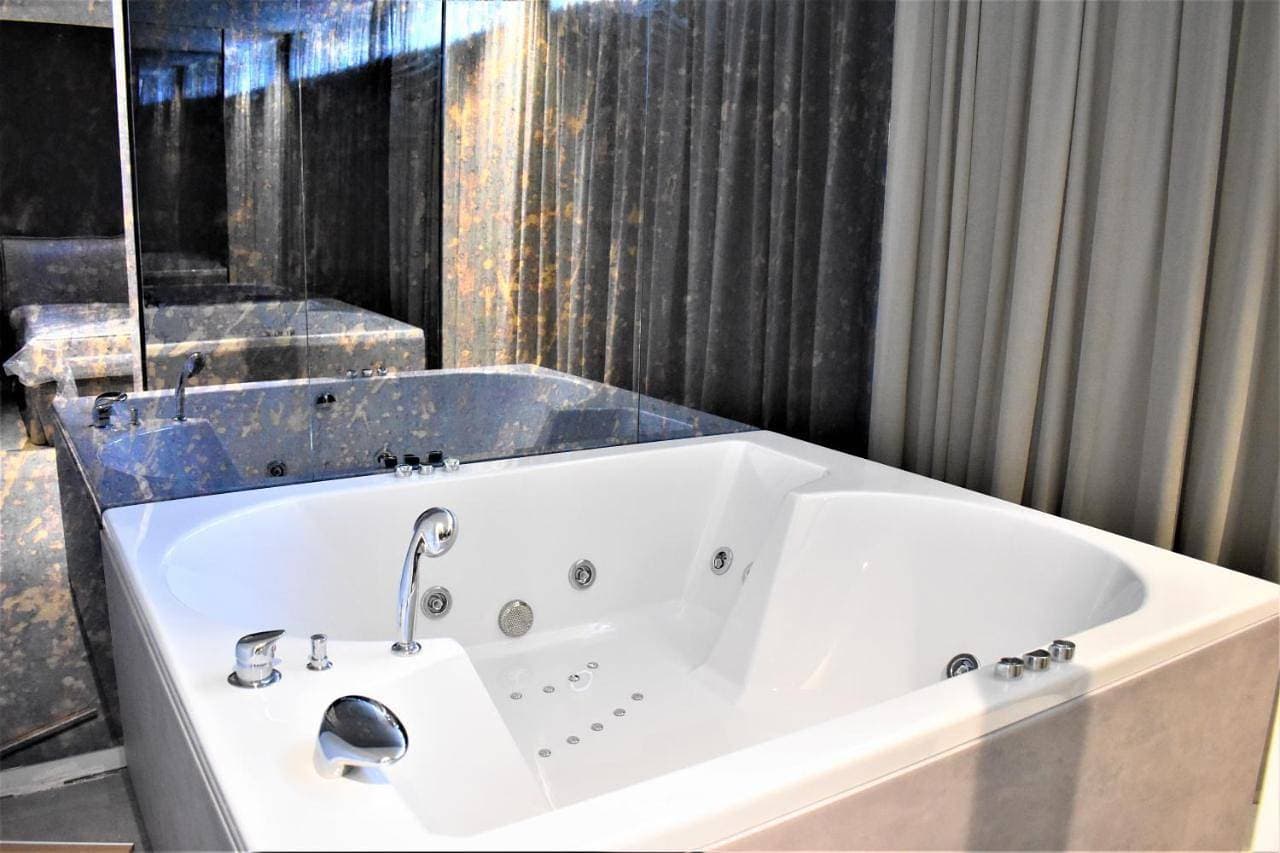 Foto 12 von 21: Suite with Spa Bath