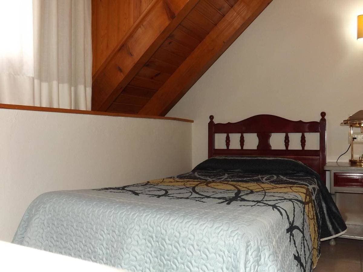 Foto 4 von 8: Triple Room with Bathroom