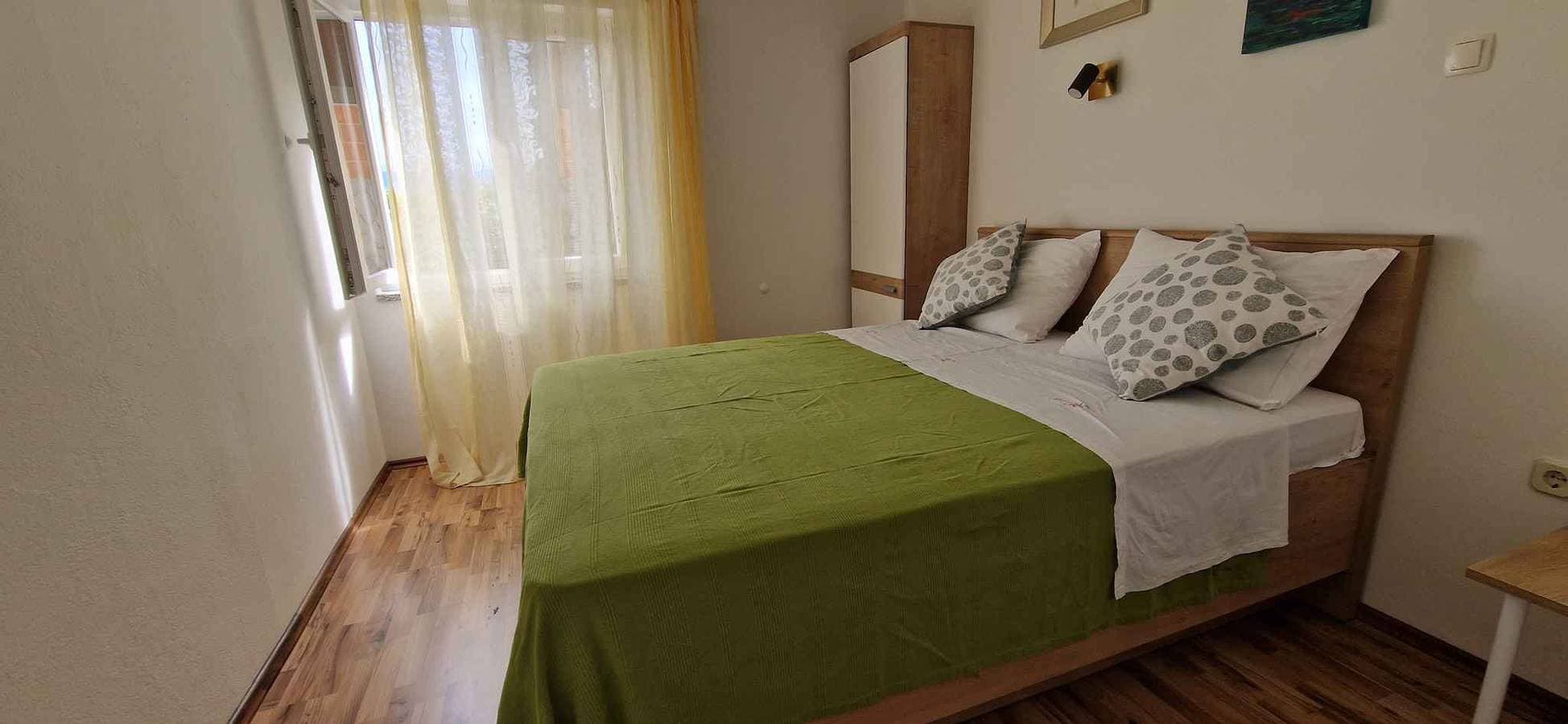 Foto 11 von 27: Ferienwohnung mit Terrasse und Klimaanlage