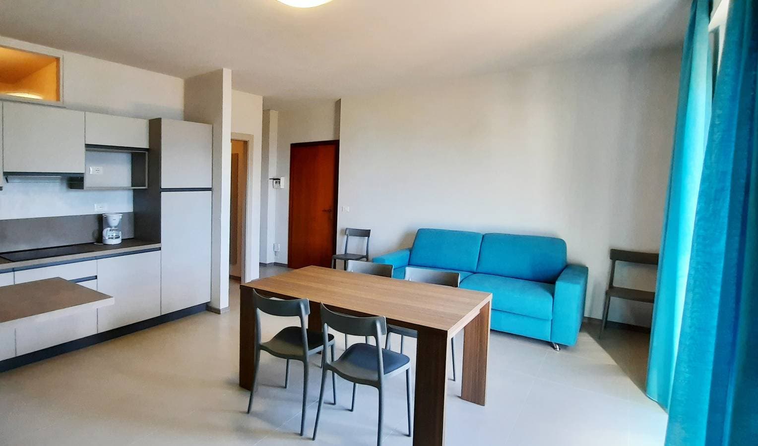 Foto 4 von 26: Appartamento 105 Benaco