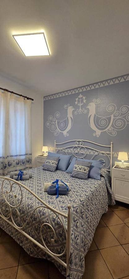 Tharros Sinis Blue Home 1