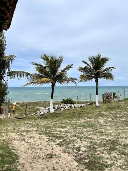 Foto 2 von 86: Casa de frente para o mar, pé na areia!
