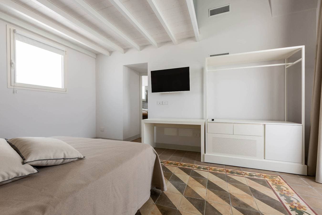 Foto 4 von 59: Hotel Perla Saracena - Suite Familiare Deluxe
