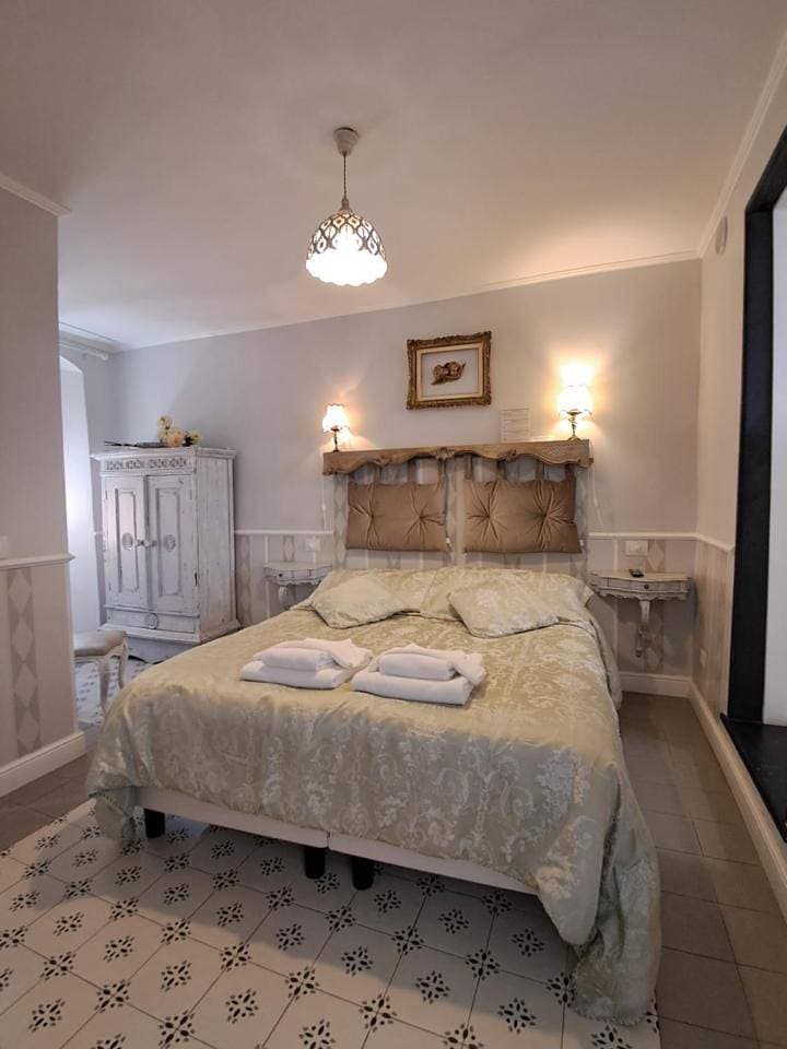 Foto 6 von 11: Triple Room with Private Bathroom