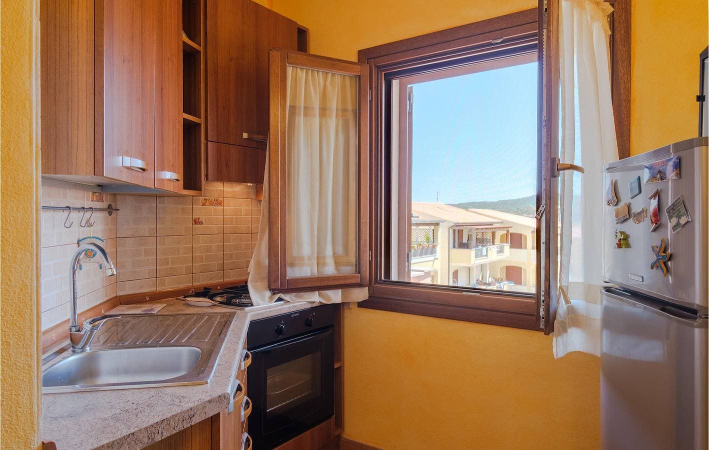 Foto 4 von 22: Gemütliches Strand-Apartment mit AC & Parkplatz