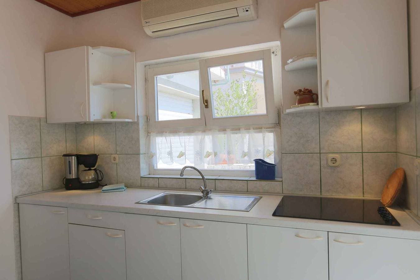 Foto 12 von 20: Ferienwohnung mit Terrasse und Klimaanlage