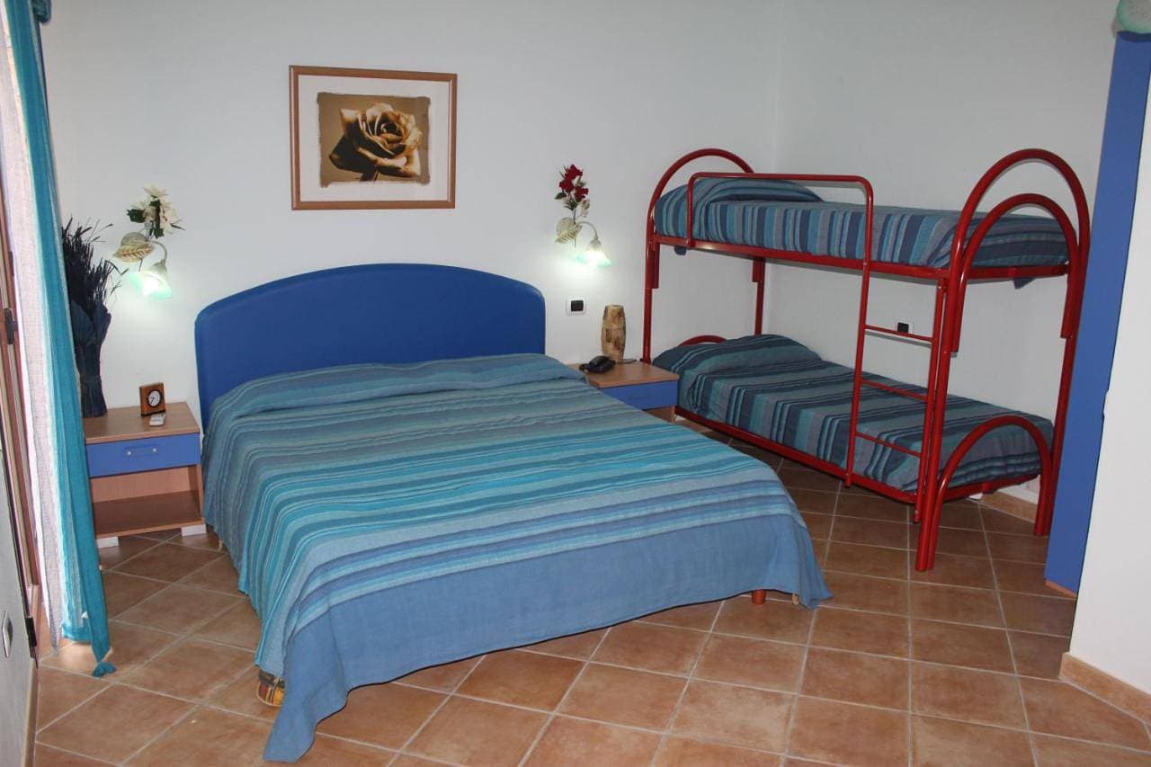 Foto 11 von 18: Quadruple Room