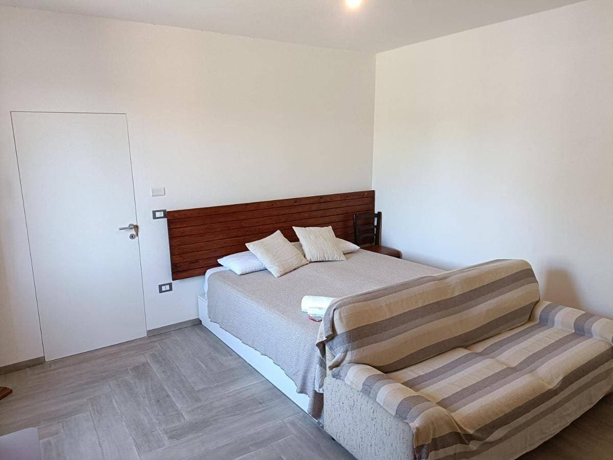 Foto 4 von 8: Quadruple Room with Private External Bathroom