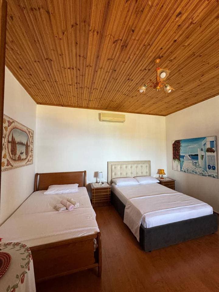 Foto 9 von 16: Triple Room with Sea View