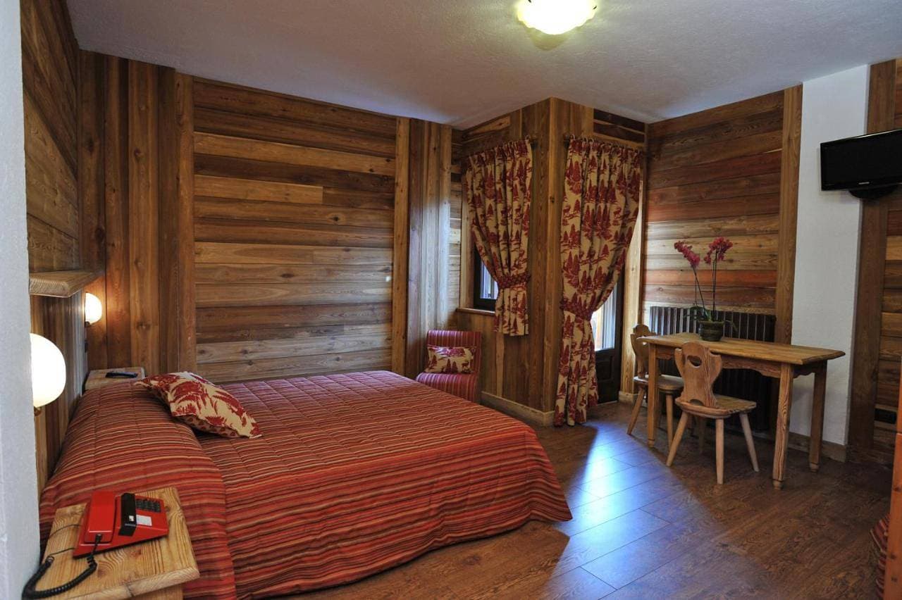 Foto 7 von 11: Quadruple Room