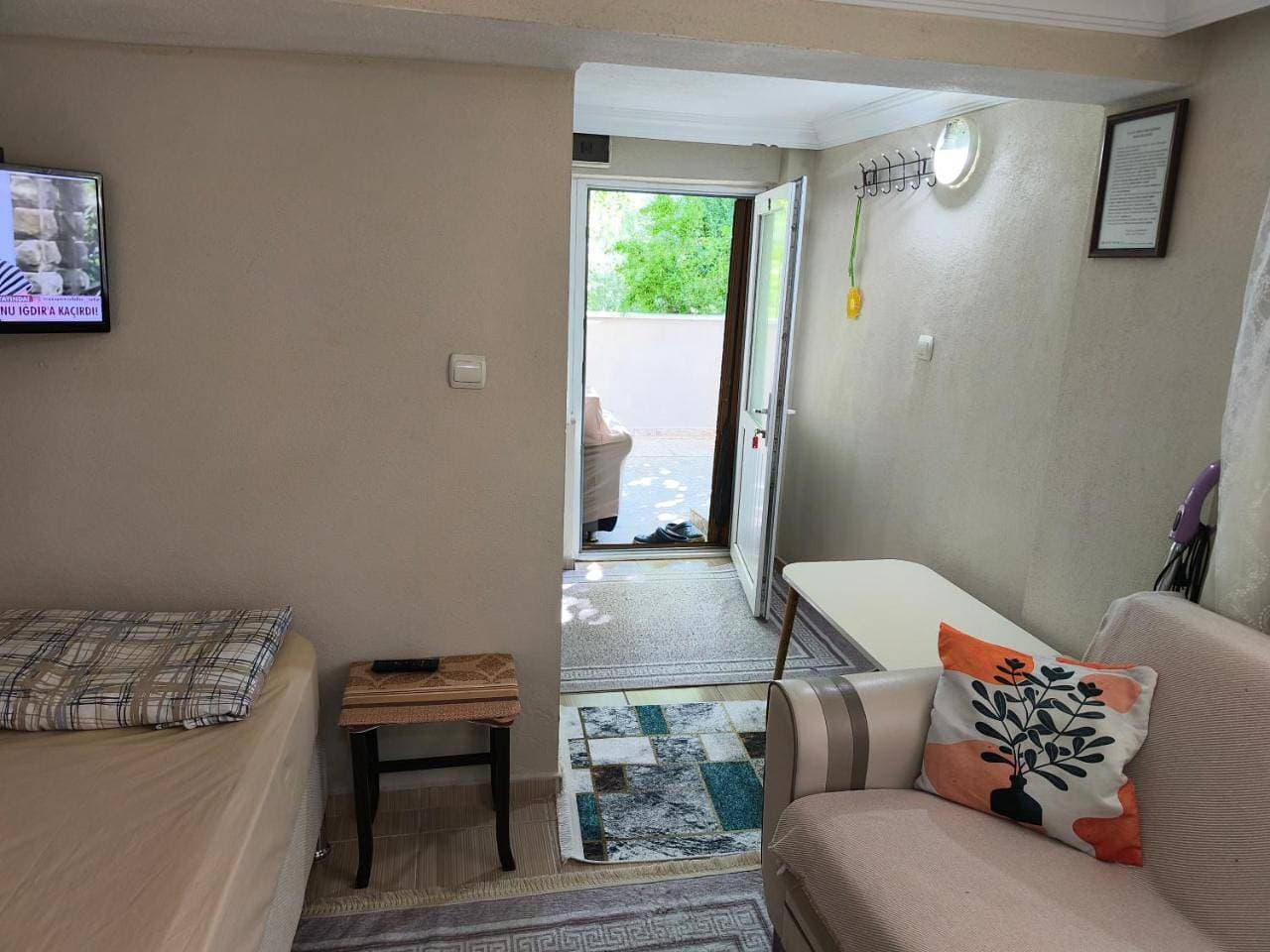 Foto 13 von 26: Quadruple Room with Garden View