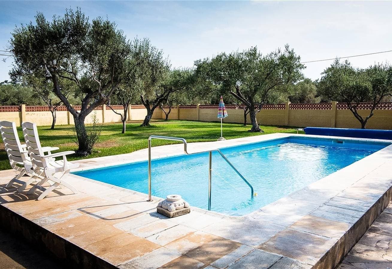 Foto 6 von 44: Villa in direkter Strandnähe ,mit privatem beleuchtetem Pool, Garten, 2Terrassen, Grill und WLAN