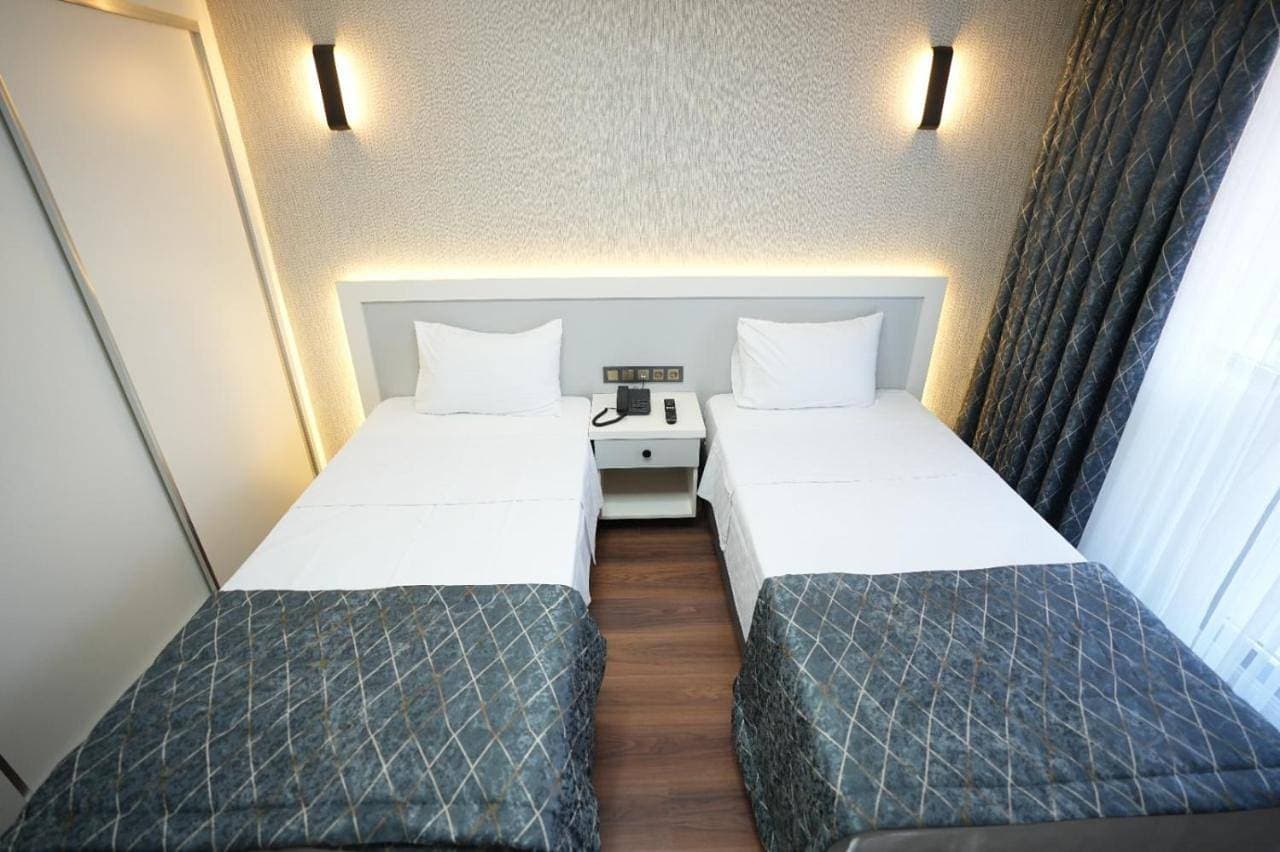 Foto 4 von 8: Double Room with Balcony