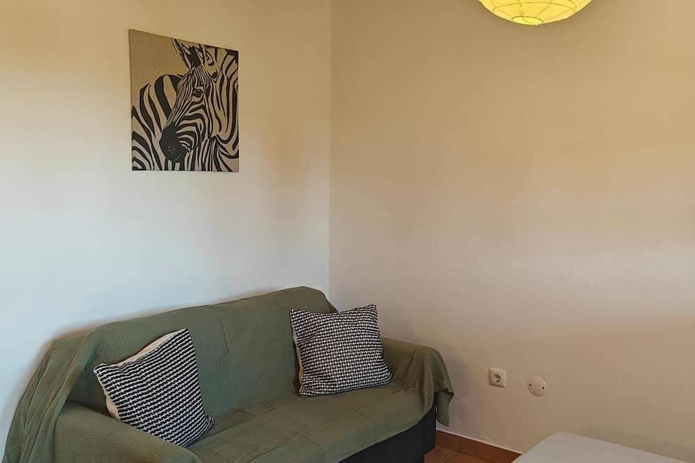 Foto 5 von 11: Ferienwohnung 'Casa Laranjeira' mit Bergblick, WLAN und Klimaanlage