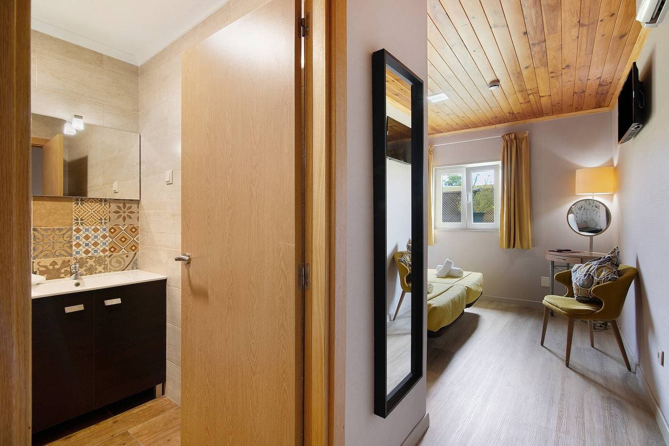 Foto 10 von 33: Ferienwohnung 'Quarto Twin 203' mit gemeinsamer Terrasse, WLAN und Klimaanlage